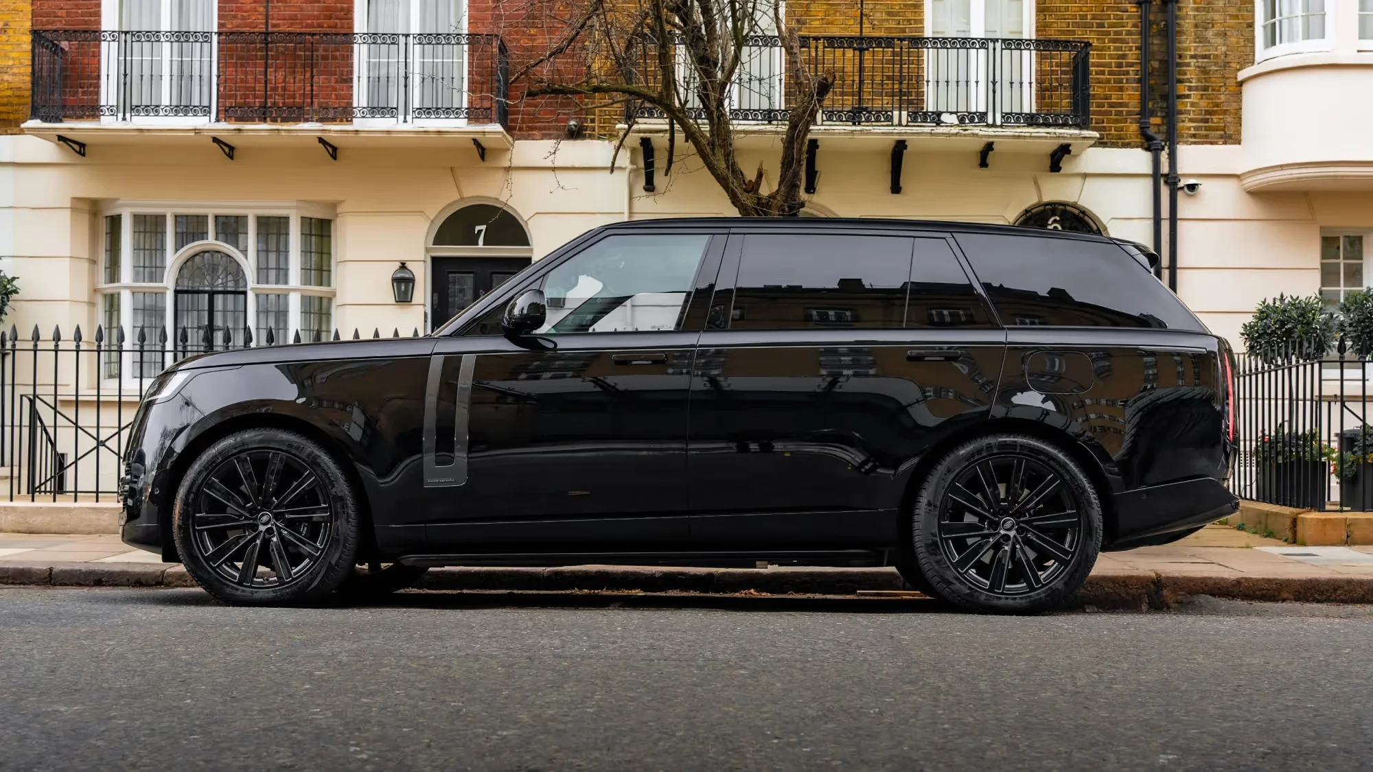 Side profile of a black Range Rover in London